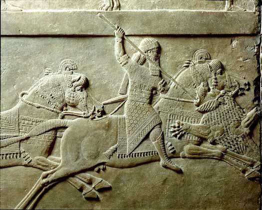 Ашшурбанипал охотится на льва (барельеф из Ниневии), фото фотография